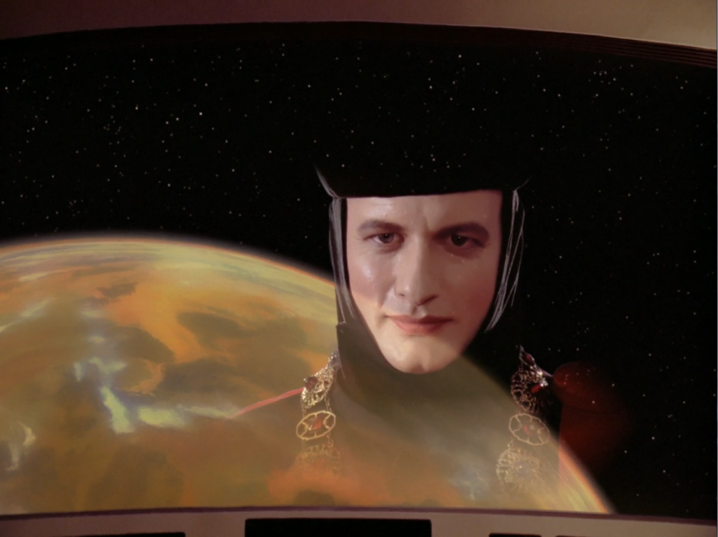 Q (played by John de Lancie)