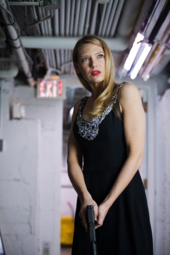 Anna Torv as Olivia Dunham wearing a dress.