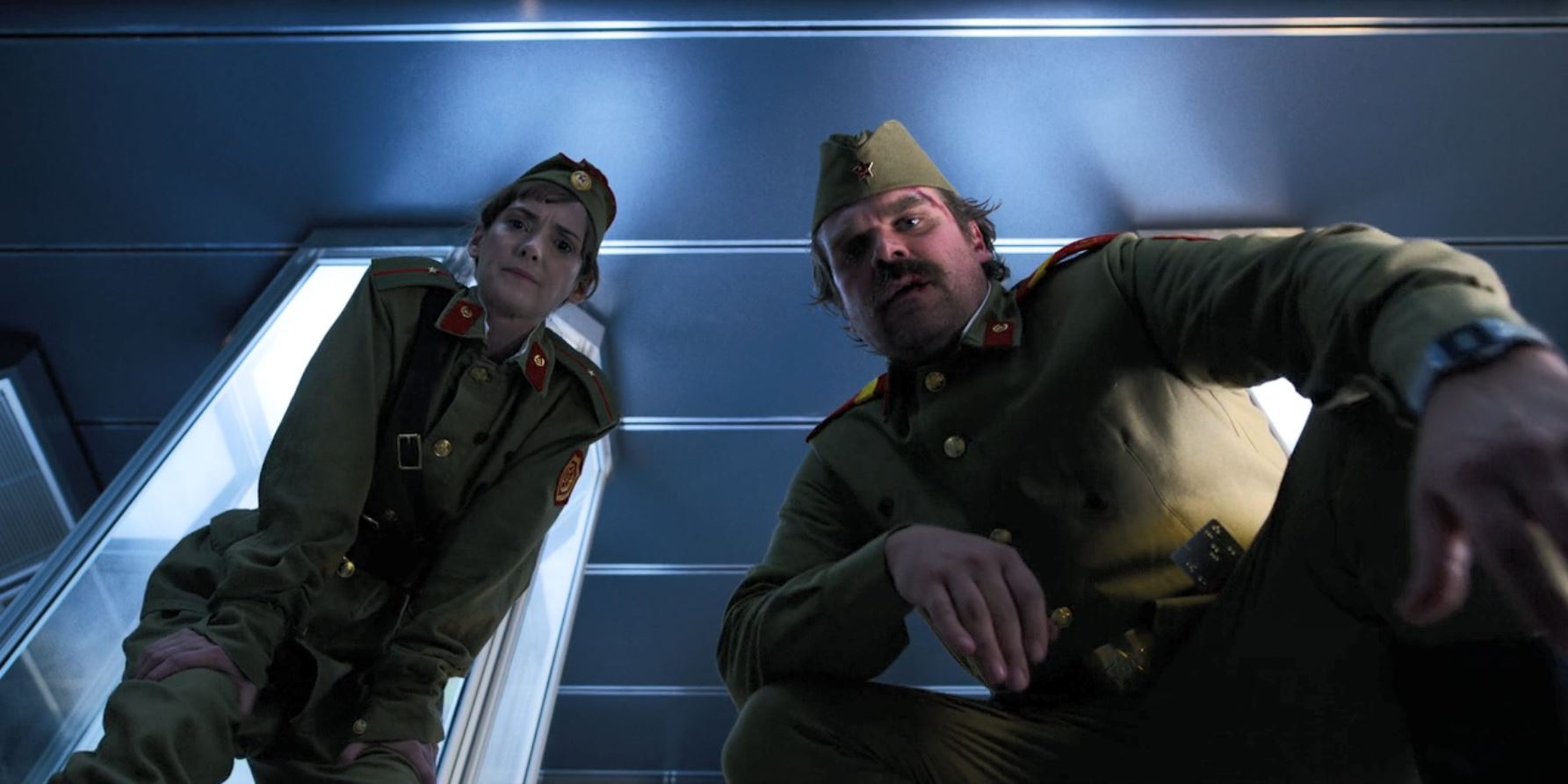 Stranger Things Season 3 Review - Jim and Joyce in Russian uniforms