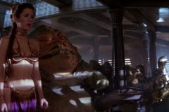 Carrie Fisher as Princess Leia in a metal bikini