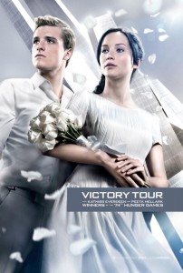 The Hunger Games: Catching Fire victory poster with Jennifer Lawrence as Katniss and Josh Hutcherson as Peeta