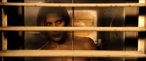 Katee Sackhoff standing topless in Riddick