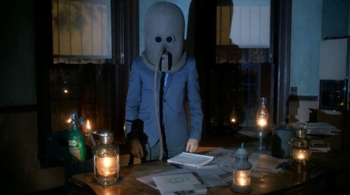 Sherlock (Jonny Lee Miller) wearing a gas mask - elementary s3ep1 review