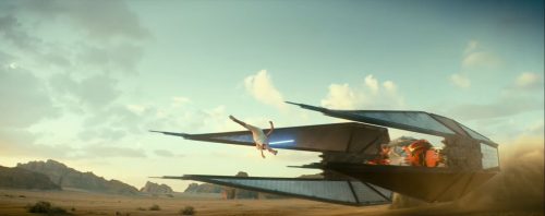 Star Wars The Rise of Skywalker Rey (Daisy Ridley) leaps over Tie-fighter